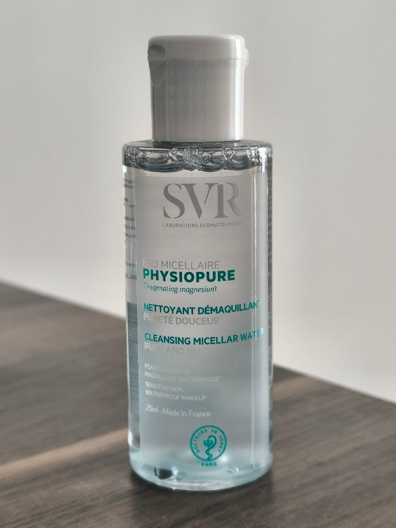 SVR Physiopure bottle on a wooden surface with a neutral background