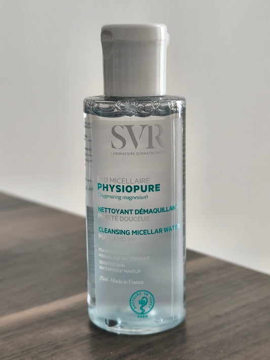 SVR Physiopure bottle on a wooden surface with a neutral background